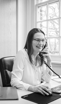 MAP employee on the telephone, smiling